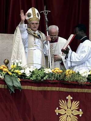 Pope Benedict XVI gives his blessing after his traditional 