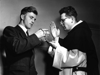 blessing a rosary