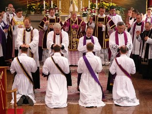 imposition of hands ordination priesthood